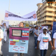 Image for article titled Some Indian men are running marathons dressed as ATM machines